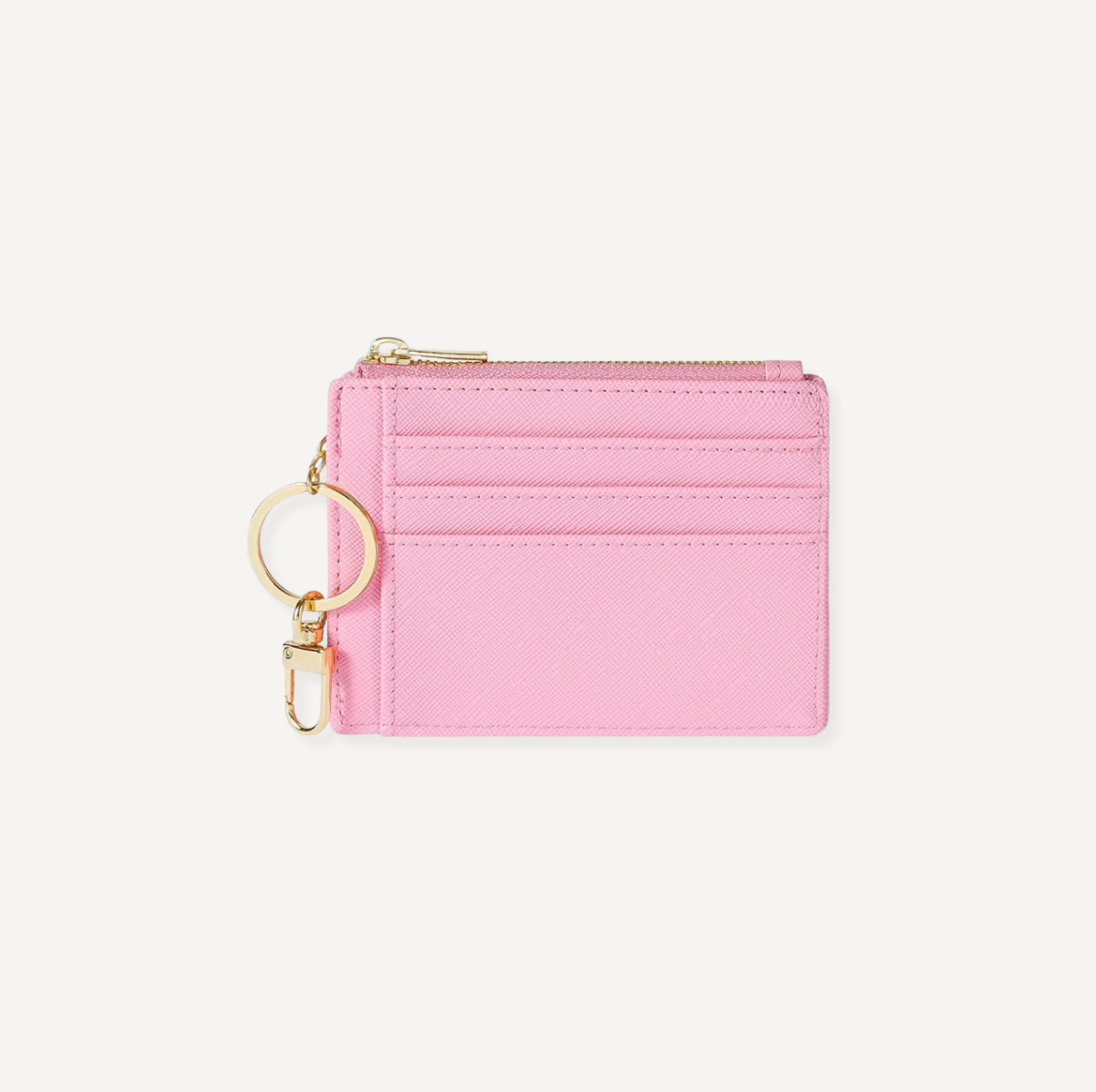 Pink cardholder with a keychain on a light gray background